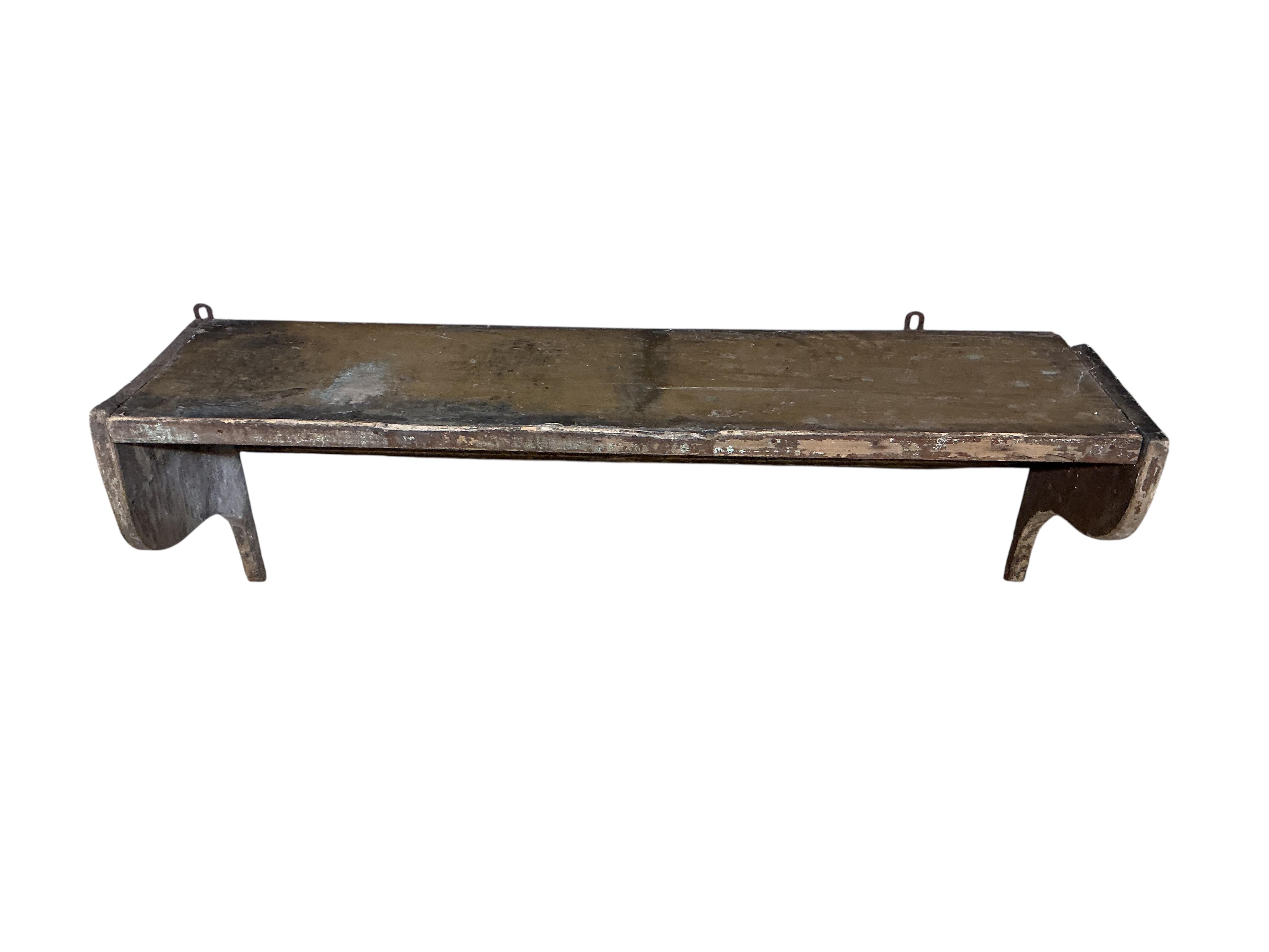 A 19th century painted pine wall bracket, width 105cm, depth 30cm, height 37cm